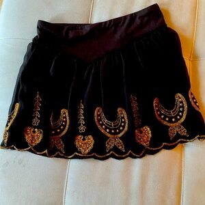 Cute black and gold short skirt